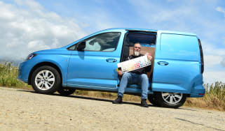 Auto Express senior test editor Dean Gibson sitting in the side of our long-term Volkswagen Caddy Cargo